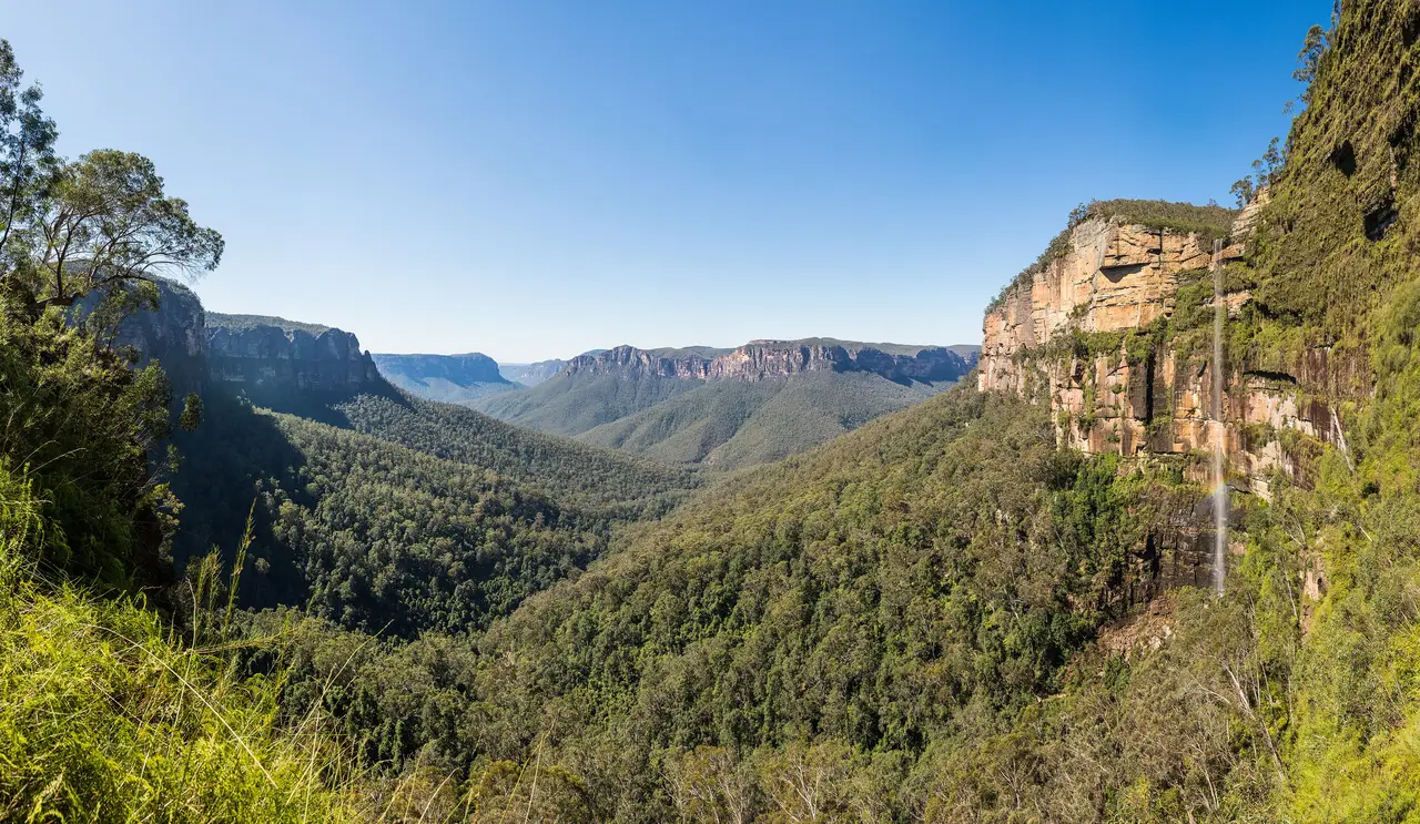 Sandstone cliffs and forested valley of the Grose Valley in the Blue Mountains